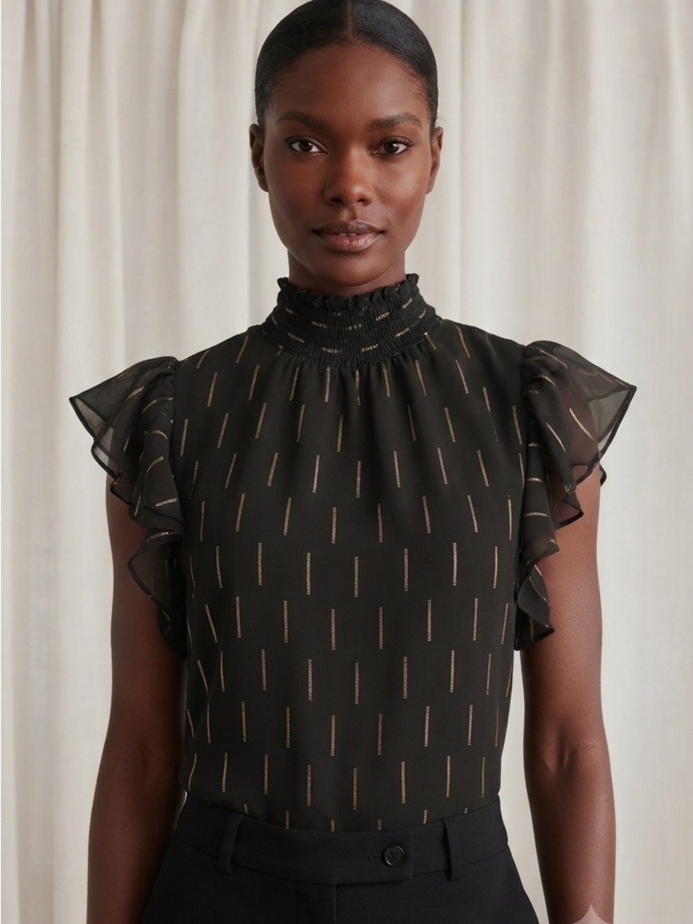 CeCe Black Sheer Blouse with Gold Stripe Accents and Ruffled Sleeves